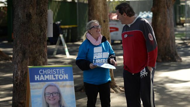 Christie Hamilton talking with a voter in the north ward.