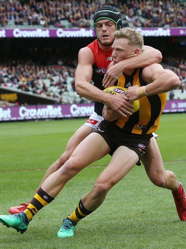 Angus Brayshaw collars James Sicily. Picture: Michael Klein