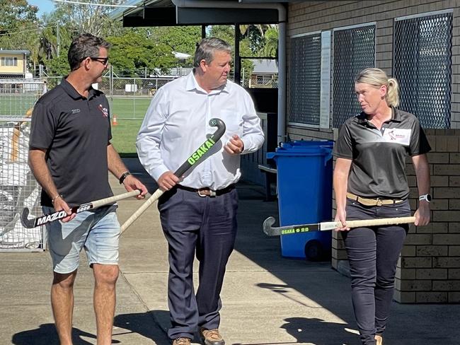 Mackay Hockey Association treasurer Melissa Sorensen, LNP candidate for Dawson Andrew Willcox and Mackay Hockey Association president Matt Murphy. Funding announcement for Mackay Hockey grandstand 13 May 2022. Picture: Max O'Driscoll