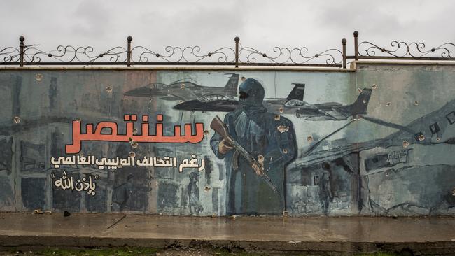 An Islamic State propaganda mural painted on a wall in east Mosul, Iraq, on January 28, 2017. Picture: Martyn Aim/Corbis via Getty Images