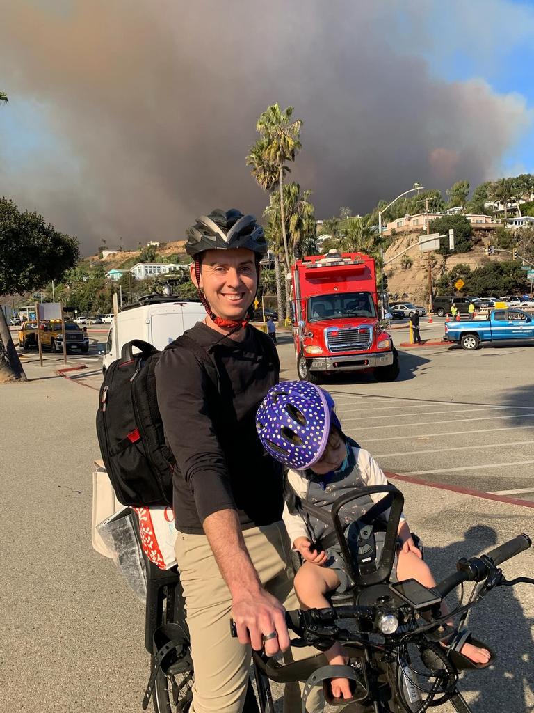 Australian Joel House fled his LA home on his bike with his sleeping daughter, after it was engulfed in fire. Picture: www.instagram.com/joelhouseofficial/