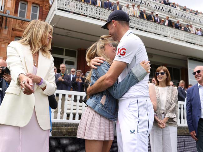 Anderson greets his family after his day as an England player. Picture: Michael Steele/Getty Images