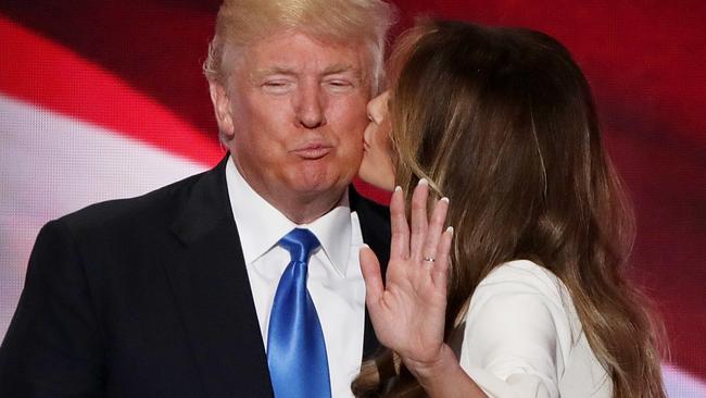 Melania Trump kisses her husband Donald Trump after she delivers a speech on the first day of the Republican National Convention. Picture: Alex Wong/Getty Images/AFP