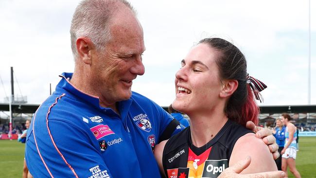 Nathan Burke (left) and Alice Burke embrace after a 2022 match between the Western Bulldogs, who Nathan was coaching, and St Kilda. Picture: Dylan Burns / Getty Images