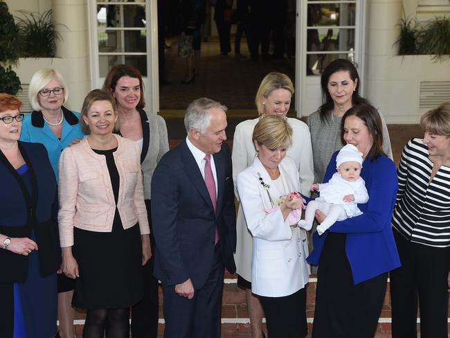 New Prime Minister Malcolm Turnbull with his new women cabinet ministers, (front, L-R) Defence Minister Marise Payne, Minister for Health, Sussan Ley, Minister for Foreign Affairs, Julie Bishop, Minister for Small Business, Kelly O'Dwyer and Minister of Women, Michaelia Cash. Picture: AFP / Peter Parks