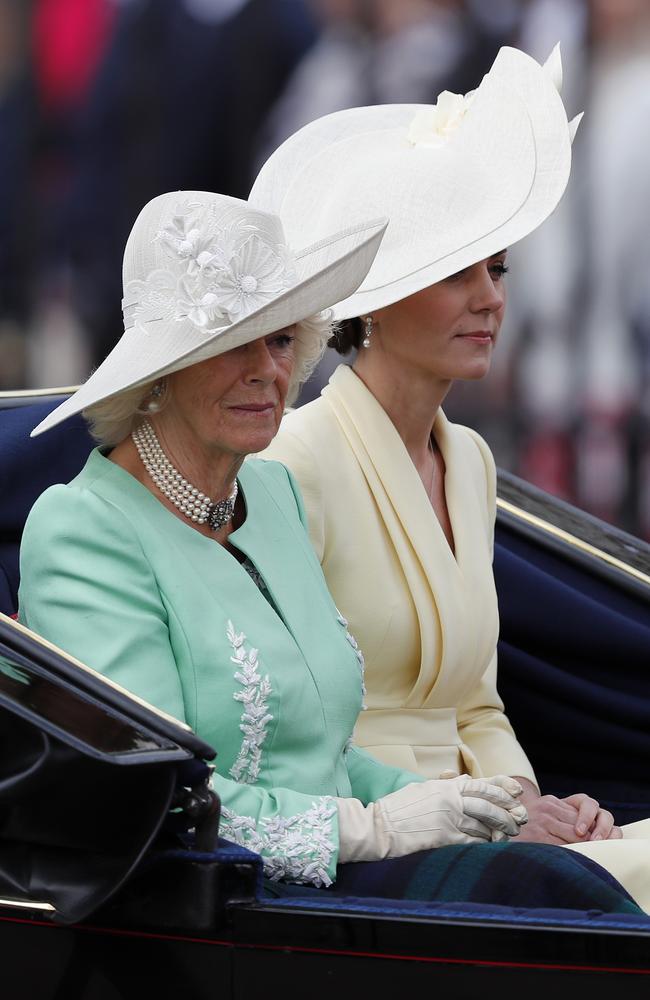 The Duchess of Cambridge looks sombre as she rides in the carriage with Camilla, the Duchess of Cornwall. Picture: AP