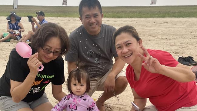 Tita Agbulos (left) with Rowena and Alex Agra and granddaughter Altair Agbulos