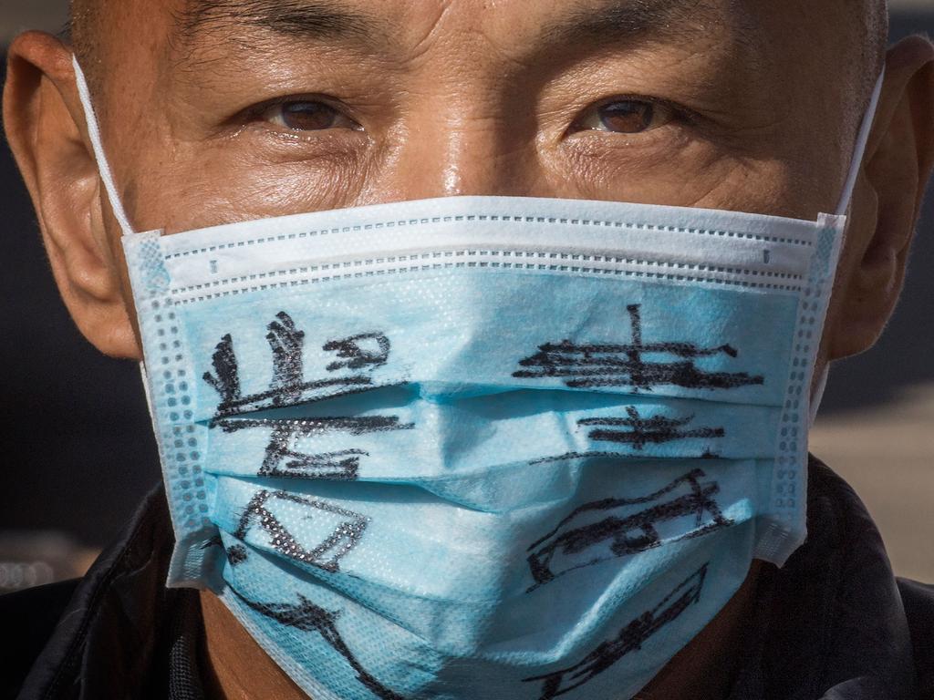 A man attends a memorial for the hero doctor in California. Picture: Mark RALSTON / AFP.