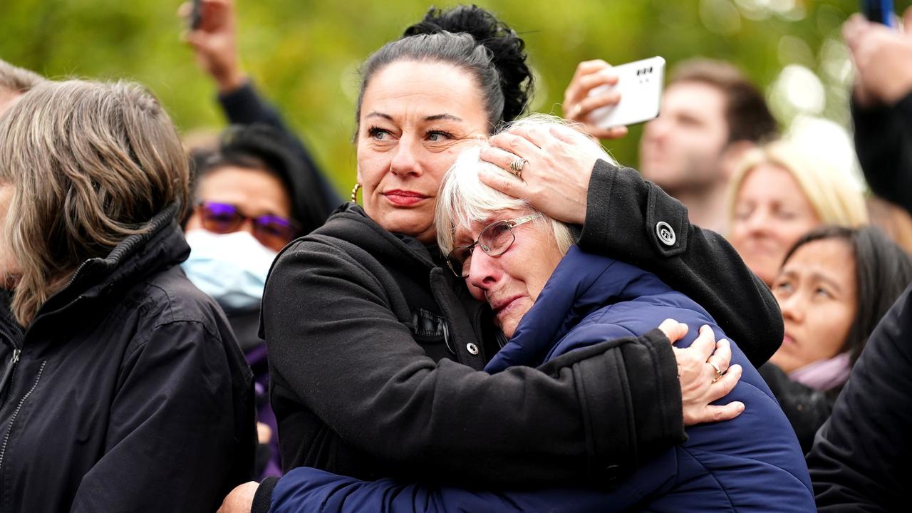 Members of the crowd listen during the state funeral. Picture: Mike Egerton – WPA Pool/Getty Images