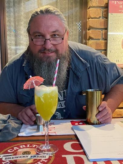 Mark 'Reeva' Reeves with one of his specialty cocktails. Picture: Supplied by family