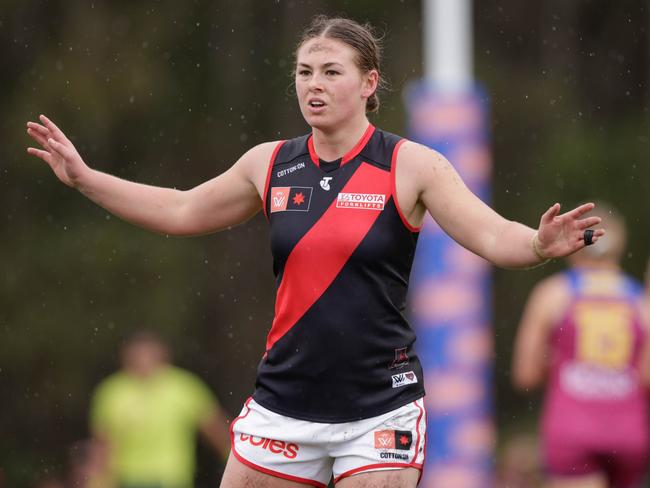 BRISBANE, AUSTRALIA - OCTOBER 02: Lily-Rose Williamson of the Bombers stands on the mark during the 2022 S7 AFLW Round 06 match between the Brisbane Lions and the Essendon Bombers at Moreton Bay Central Sports Complex on October 2, 2022 in Brisbane, Australia. (Photo by Russell Freeman/AFL Photos via Getty Images)