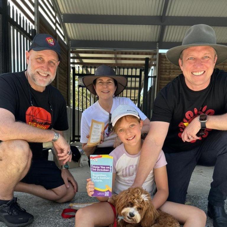 Deputy Premier Steven Miles with daughter Bridie, pooch Matilda and Yes campaign volunteers. Picture: Supplied.