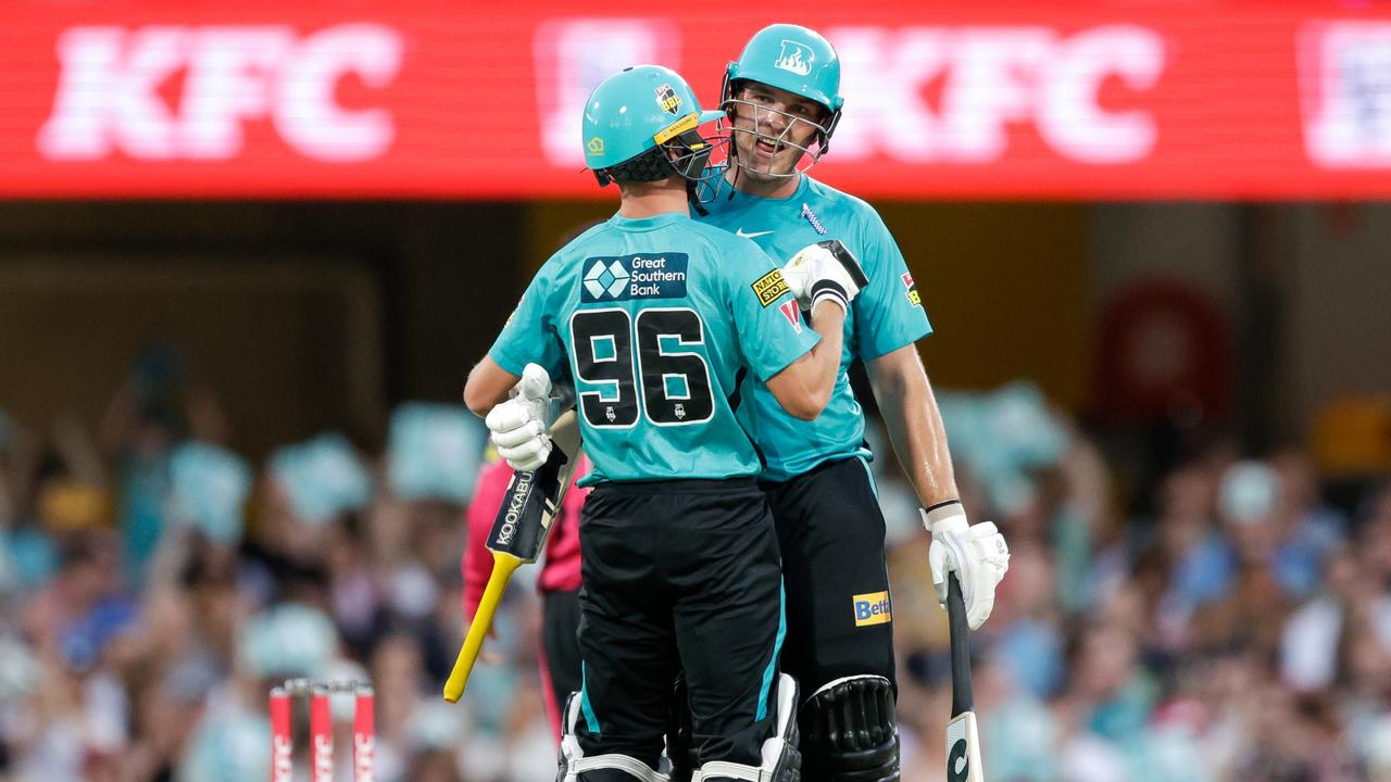 Brisbane’s Josh Brown celebrates his half century. Picture: Russell Freeman