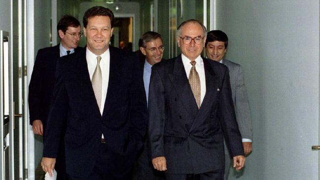 Alexander Downer leaves the Liberal Party meeting with John Howard. Picture: Michael Jones.