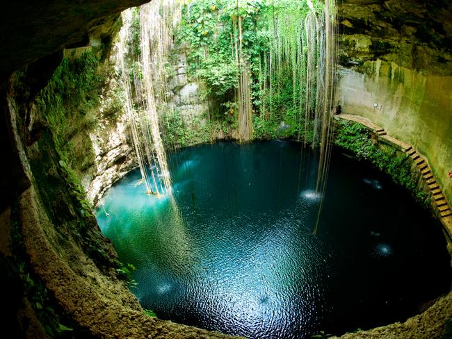 Ik Kil Cenote, Chichen Itza in Mexico. Such natural cave-lakes played a significant role in ancient Mayan culture.