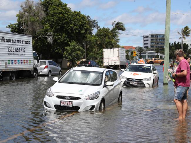Flooding from the King tide at Budds Beach at Surfers Paradise was made worse by the approaching storm system. Picture Glenn Hampson