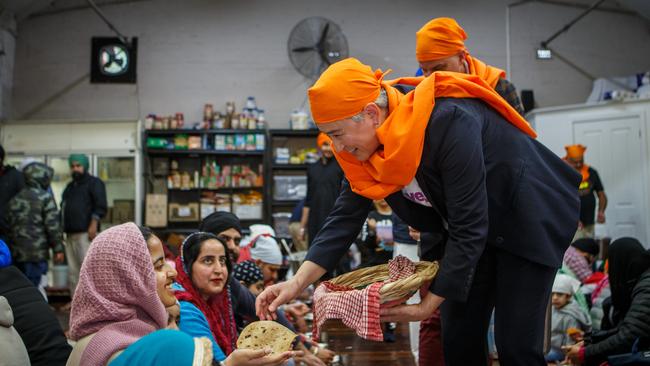 Noel Pearson, partly obscured, and Foreign Minister Penny Wong at a Sikh Temple in Allenby Gardens, Adelaide. Picture: Matt Turner