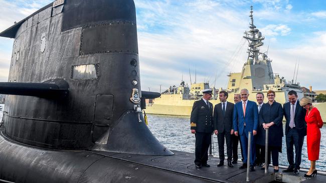 Turnbull and French President Emmanuel Macron on the deck of HMAS Waller, a Collins-class submarine operated by the Royal Australian Navy, at Garden Island in Sydney.