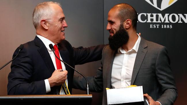 Australian Prime Minister Malcolm Turnbull with Richmond’s Bachar Houli. (Photo by Adam Trafford/AFL Media/Getty Images)