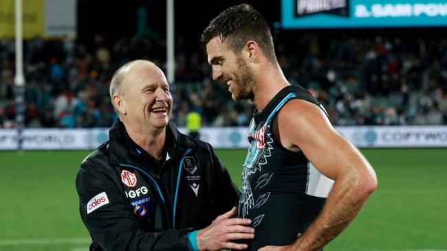 ADELAIDE, AUSTRALIA – MAY 19: Ken Hinkley and Scott Lycett of the Power celebrate their win during the 2023 AFL Round 10 match between Yartapuulti/Port Adelaide Power and Narrm/Melbourne Demons at Adelaide Oval on May 19, 2023 in Adelaide, Australia. (Photo by James Elsby/AFL Photos via Getty Images)