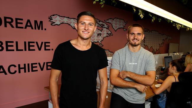 Gold Coast millionare businessmen Nik Mirkovic and Alex Tomic from HiSmile at their new office in Mermaid Beach. Picture: Adam Head