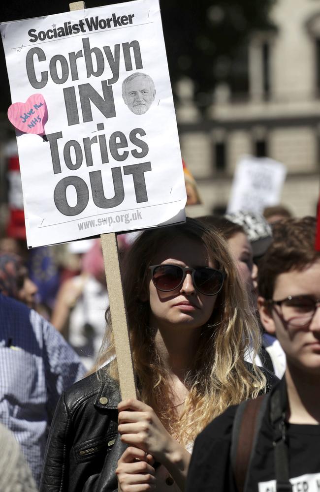 People demonstrate in Parliament Square against the possible Conservative and DUP (Democratic Unionist Party) coalition government following the Britain's general election result. Picture: Tim Ireland/AP