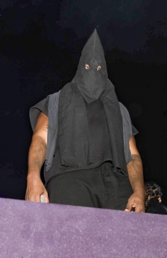 Kanye West wears KKK-style hood to album listening party | Herald Sun