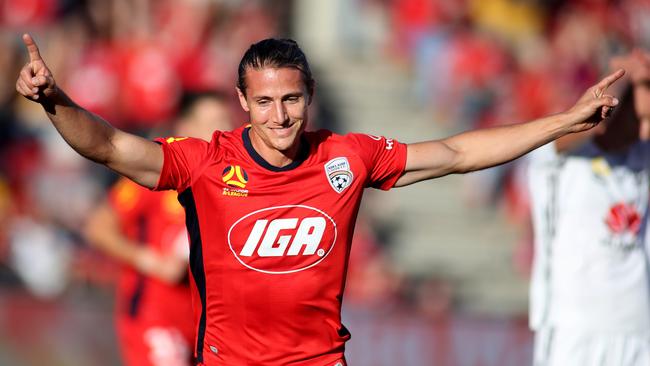 Michael Marrone celebrates a goal during the round 24 A-League match between Adelaide United and the Wellington Phoenix. Picture: Kelly Barnes/Getty Images