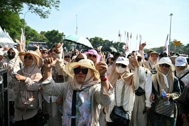 Tens of thousands lined the streets of Jakarta as Prabowo Subianto became Indonesia's eighth leader