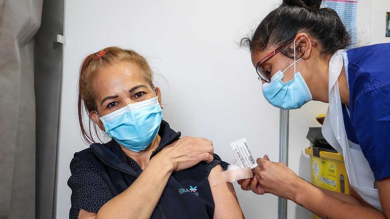 BlueCross Aged Care worker Isabelita Tassone receives the AstraZeneca vaccine at Sunshine Hospital. Picture : Ian Currie