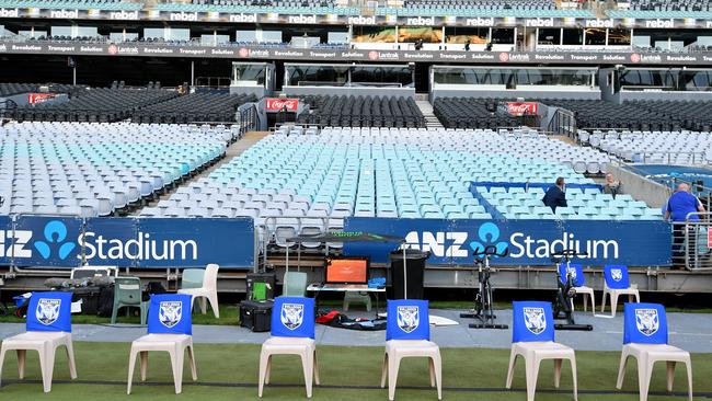 Player benches are seen with the new NRL distancing policy employed, at an empty ANZ Stadium ahead of Thursday night’s the match between the Canterbury-Bankstown Bulldogs and the North Queensland Cowboys played in an empty ANZ stadium Picture: Dan Himbrechts/AAP