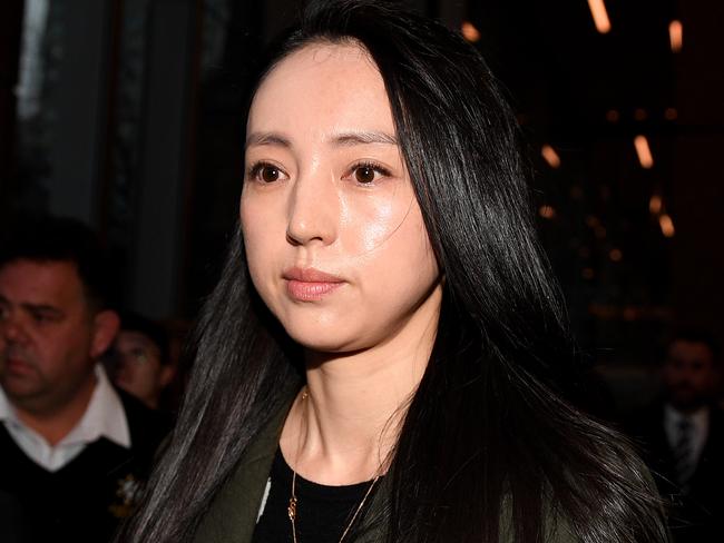 Xuan Dong, wife of Chinese actor Yuinxiang Gao, leaves the NSW Supreme Court on Thursday.