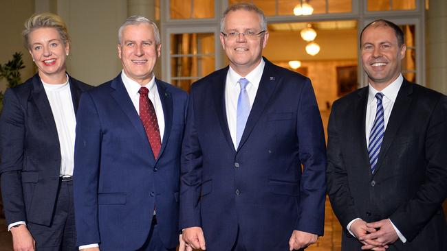 Prime Minister Scott Morrison (2nd R) with Sport Minister Bridget McKenzie (L), Deputy PM Michael McCormack (2nd L) and deputy Liberal party leader Josh Frydenberg (R).