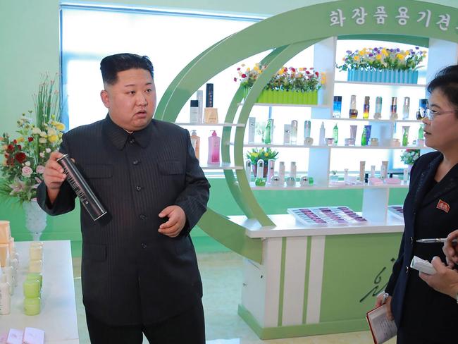 Now we know where Kim Jong-un’s hair gets its body and bounce. Picture: AFP/KCNA via KNS