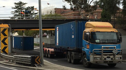 The truck lost a container after hitting the Napier St railway bridge in Footscray today. Picture: Supplied