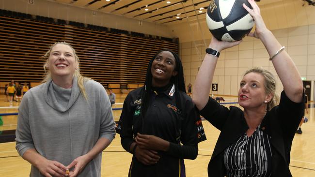 Ezi Magbegor with Lauren Jackson and then Sport Minister Bridget McKenzie in South. Picture: Stuart Milligan