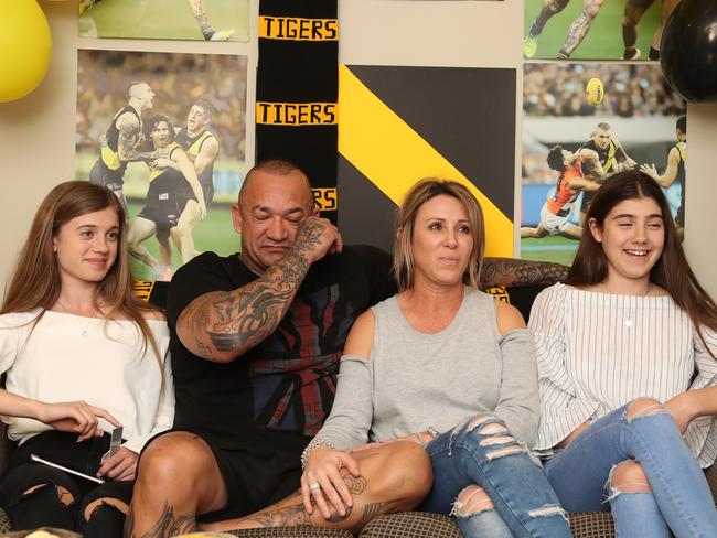 An emotional Shane Martin with wife Adriana Martin and stepdaughters Emma De Bernardi, 17, and Alana De Bernardi, 15. Picture: Alex Coppel.