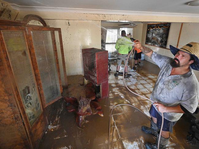 01/03/2022: While most areas are still impossible to access some local volunteers ( the start of what will become  a mud army ) can begin the huge clean up task in Goodna after floods and rain swamped Brisbane.  Pic Lyndon Mechielsen/The Australian