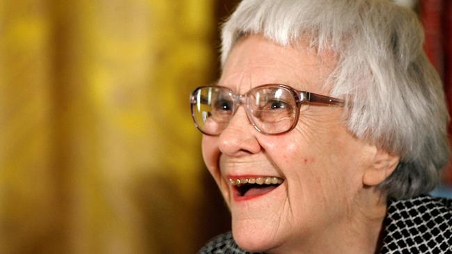 Harper Lee receives the medal of freedom from President Geroge W. Bush in 2005.