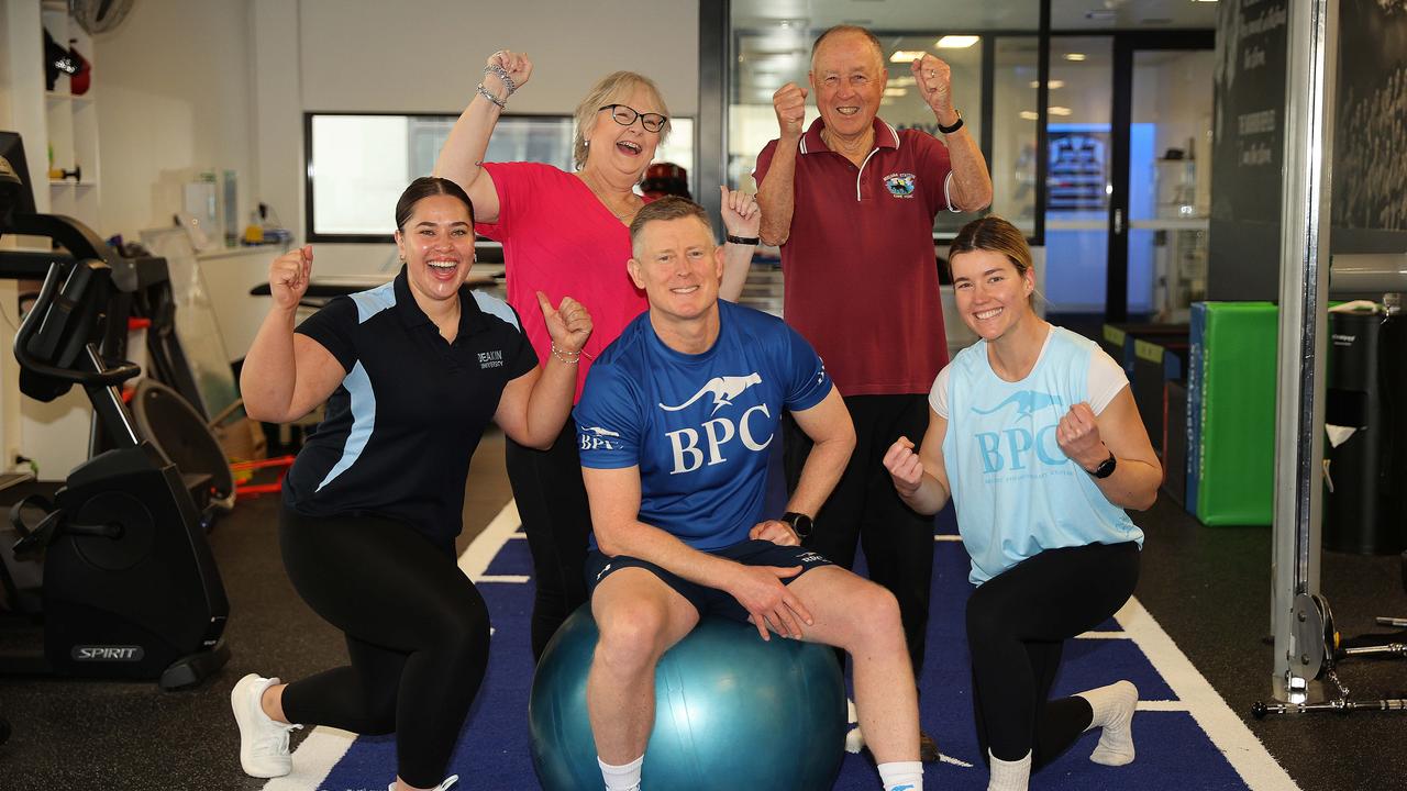 Travis McCombe of Belmont Physiotherapy Centre, middle, was voted Geelong’s best physio by Geelong Addy readers. Pictured with celebrating staff and clients from left Maddy Day, Pam Moorfoot, Mark Seller and Victoria Herring. Picture: Alison Wynd