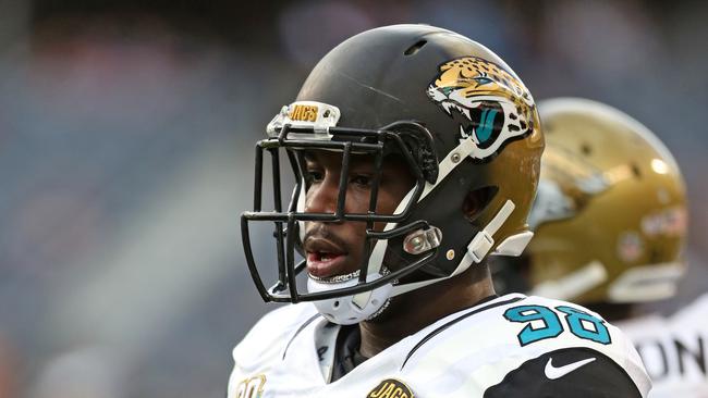 CHICAGO, IL – AUGUST 14: Chris Smith #98 of the Jacksonville Jaguars warms up prior to a pre-season game against the Chicago Bears at Soldier Field on August 14, 2014 in Chicago, Illinois. (Photo by John Konstantaras/Getty Images)