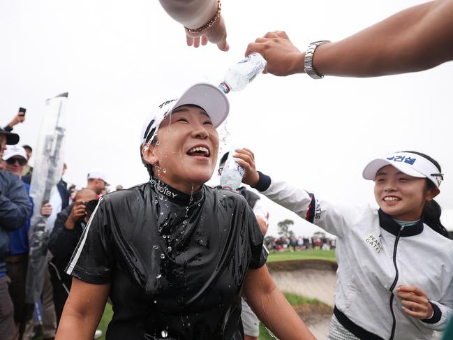 MELBOURNE, AUSTRALIA - DECEMBER 01: Jiyai Shin of Republic of Korea celebrates victory on the 18th green on day four of the ISPS Handa Australian Open 2024 at Kingston Heath Golf Club on December 01, 2024 in Melbourne, Australia. (Photo by Morgan Hancock/Getty Images)