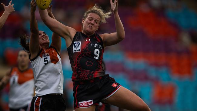 Jemma Iacono and Jaimee-Lee Morrow battle for the ball as the NTFL Buffaloes' women side beat the Essendon Bombers. Picture: Pema Tamang Pakhrin