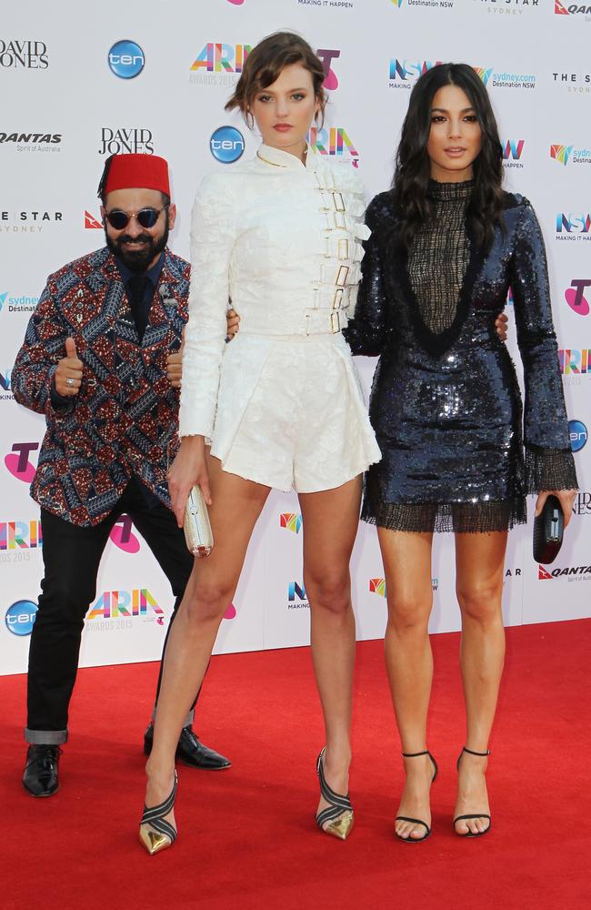 Montana Cox and Jessica Gomes with Joseph Tawadros in the background at the 2015 Aria Awards held at The Star in Pyrmont. Picture: Christian Gilles