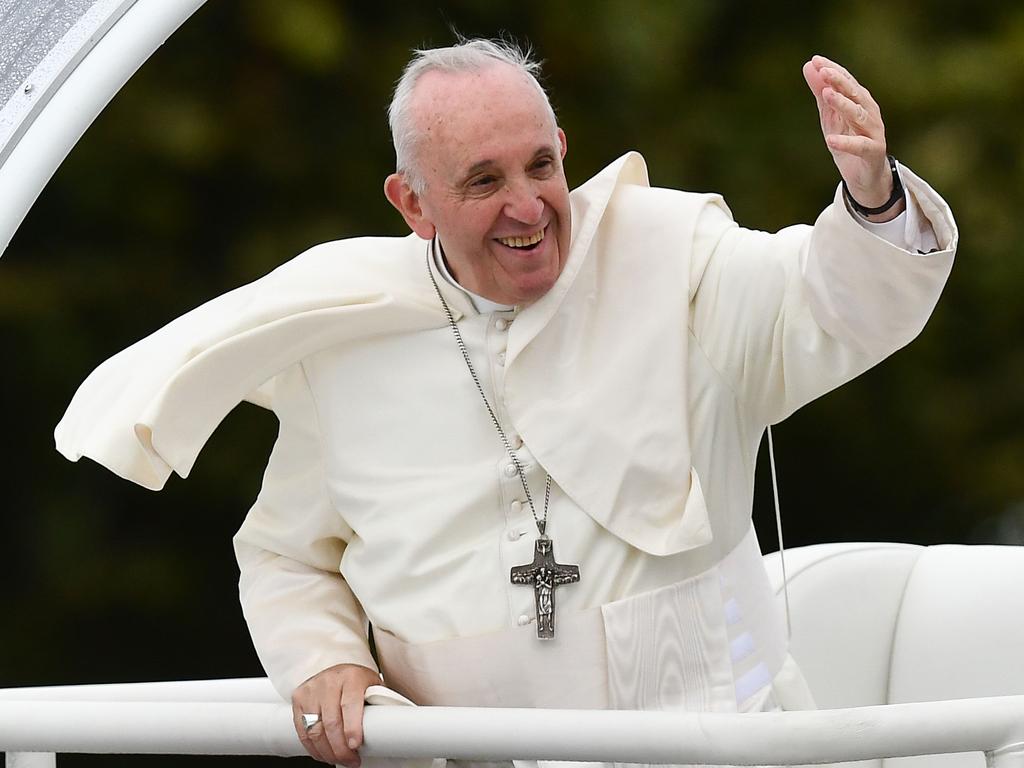 Pope Francis waves to the faithful as he arrives to lead the Holy Mass at Phoenix Park in Dublin on August 26, 2018, during his visit to Ireland to attend the 2018 World Meeting of Families. Picture: AFP