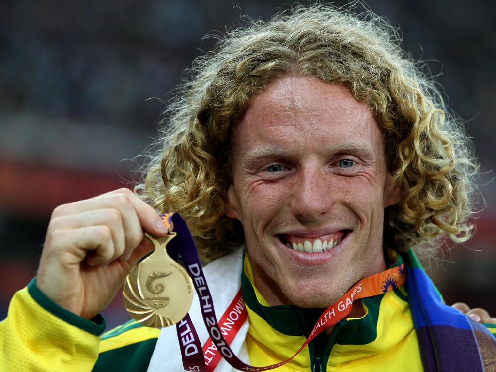 Steve Hooker on the podium at the Delhi 2010 Commonwealth Games. (Photo by Michael Steele/Getty Images)