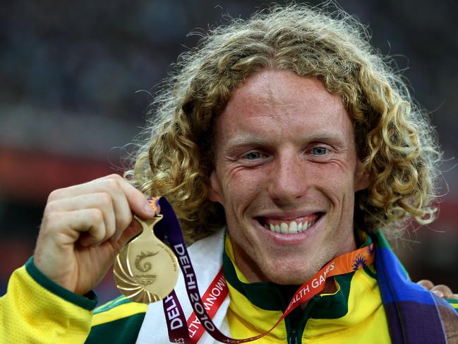 Steve Hooker on the podium at the Delhi 2010 Commonwealth Games. (Photo by Michael Steele/Getty Images)