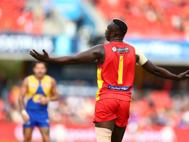 Mabior Chol celebrates one of his five goals against the West Coast Eagles. Picture: Chris Hyde/Getty Images