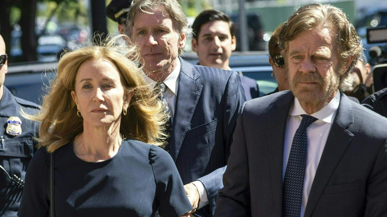 Felicity Huffman, escorted by her husband William H. Macy, on the day of her sentencing last month. Picture: Joseph Prezioso/AFP