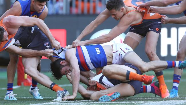 Bulldogs skipper Easton Wood tangles with Toby Greene at GIANTS Stadium during the finals. Picture: Getty Images